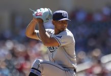Tampa Bay Rays' pitcher Luis Patino (61) throws against the Minnesota Twins during the first inning of a baseball game, Sunday, Aug. 15, 2021, in Minneapolis.