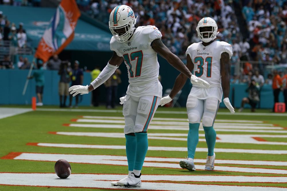 Miami Dolphins running back Raheem Mostert (31) runs for a touchdown during  the second half of an NFL football game against the Cleveland Browns,  Sunday, Nov. 13, 2022, in Miami Gardens, Fla. (