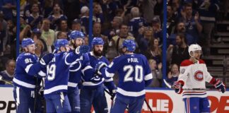 Tampa Bay Lightning celebrate defenseman Victor Hedman's (77) goal during the first period of an NHL hockey game against the Montreal Canadiens, Saturday, March 18, 2023, in Tampa, Fla.