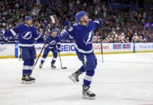 Tampa Bay Lightning's Ross Colton (79) celebrates his goal against the Philadelphia Flyers with Nicholas Paul (20) during the second period of an NHL hockey game Tuesday, March 7, 2023, in Tampa, Fla.