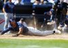 Tampa Bay Rays' Richie Palacios (1) scores against the New York Yankees in the 10th inning inning of a baseball game, Saturday, April 20, 2024 in New York. The Rays won 2-1. (AP Photo/Noah K. Murray)