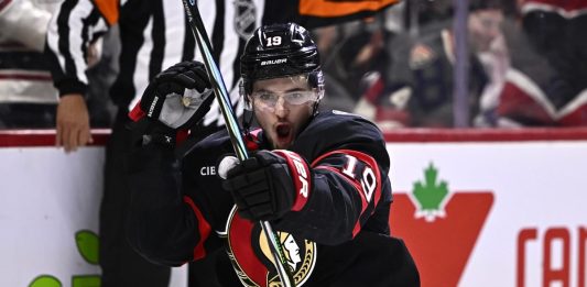 Ottawa Senators right wing Drake Batherson (19) celebrates his goal against the Tampa Bay Lightning during second period NHL hockey action in Ottawa, on Saturday, Oct. 19, 2024. (Justin Tang/The Canadian Press via AP)