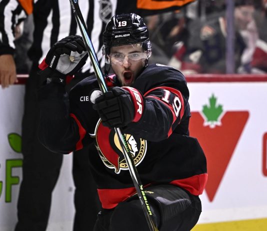 Ottawa Senators right wing Drake Batherson (19) celebrates his goal against the Tampa Bay Lightning during second period NHL hockey action in Ottawa, on Saturday, Oct. 19, 2024. (Justin Tang/The Canadian Press via AP)