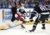 New Jersey Devils center Jack Hughes (86) slips the puck away from Tampa Bay Lightning defenseman Erik Cernak (81) during the first period of an NHL hockey game Saturday, Nov. 16, 2024, in Tampa, Fla. (AP Photo/Chris O'Meara)