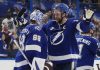 Tampa Bay Lightning defenseman Victor Hedman (77) hugs goaltender Andrei Vasilevskiy (88) after Vasilevskiy picked up his 300th career win during an NHL hockey game against the Winnipeg Jets Thursday, Nov. 14, 2024, in Tampa, Fla. (AP Photo/Chris O'Meara)