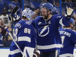 Tampa Bay Lightning defenseman Victor Hedman (77) hugs goaltender Andrei Vasilevskiy (88) after Vasilevskiy picked up his 300th career win during an NHL hockey game against the Winnipeg Jets Thursday, Nov. 14, 2024, in Tampa, Fla. (AP Photo/Chris O'Meara)