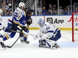 St. Louis Blues' Oskar Sundqvist (70) scores past Tampa Bay Lightning goaltender Andrei Vasilevskiy (88) during the second period of an NHL hockey game Tuesday, Nov. 5, 2024, in St. Louis. (AP Photo/Scott Kane)