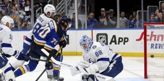 St. Louis Blues' Oskar Sundqvist (70) scores past Tampa Bay Lightning goaltender Andrei Vasilevskiy (88) during the second period of an NHL hockey game Tuesday, Nov. 5, 2024, in St. Louis. (AP Photo/Scott Kane)