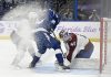 Colorado Avalanche goaltender Alexandar Georgiev (40) makes a save against Tampa Bay Lightning left wing Brandon Hagel (38) during the second period of an NHL hockey game Monday, Nov. 25, 2024, in Tampa, Fla. (AP Photo/Jason Behnken)