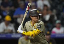 San Diego Padres shortstop Ha-Seong Kim (7) in the ninth inning of a baseball game, Aug. 17, 2024, in Denver. (AP Photo/David Zalubowski, file)