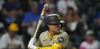 San Diego Padres shortstop Ha-Seong Kim (7) in the ninth inning of a baseball game, Aug. 17, 2024, in Denver. (AP Photo/David Zalubowski, file)