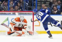 Tampa Bay Lightning center Jake Guentzel (59) scores past Anaheim Ducks goaltender Lukas Dostal (1) during a shootout in an NHL hockey game Thursday, Jan. 16, 2025, in Tampa, Fla. (AP Photo/Chris O'Meara)