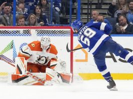 Tampa Bay Lightning center Jake Guentzel (59) scores past Anaheim Ducks goaltender Lukas Dostal (1) during a shootout in an NHL hockey game Thursday, Jan. 16, 2025, in Tampa, Fla. (AP Photo/Chris O'Meara)