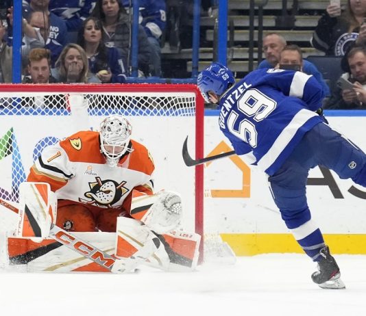 Tampa Bay Lightning center Jake Guentzel (59) scores past Anaheim Ducks goaltender Lukas Dostal (1) during a shootout in an NHL hockey game Thursday, Jan. 16, 2025, in Tampa, Fla. (AP Photo/Chris O'Meara)