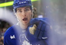 Toronto Maple Leafs' Matthew Knies celebrates a goal during the second period of an NHL hockey game against the Tampa Bay Lightning in Toronto, Monday, Jan. 20, 2025.. (Cole Burston/The Canadian Press via AP)