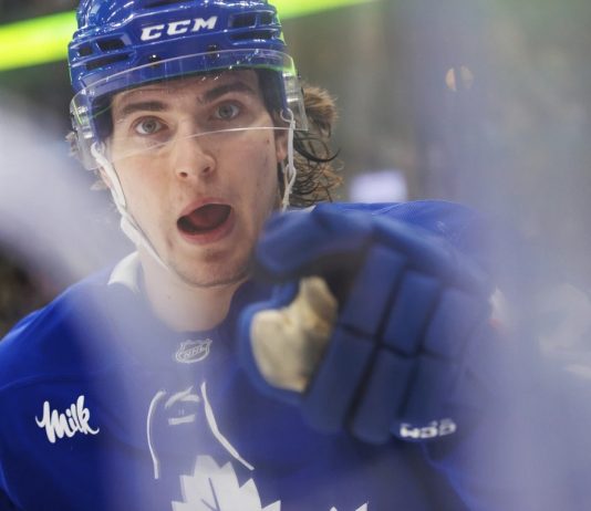 Toronto Maple Leafs' Matthew Knies celebrates a goal during the second period of an NHL hockey game against the Tampa Bay Lightning in Toronto, Monday, Jan. 20, 2025.. (Cole Burston/The Canadian Press via AP)