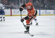 Anaheim Ducks right wing Frank Vatrano (77) shoots the puck during the first period of an NHL hockey game against the Tampa Bay Lightning, Sunday, Jan. 5, 2025, in Anaheim, Calif. (AP Photo/William Liang)