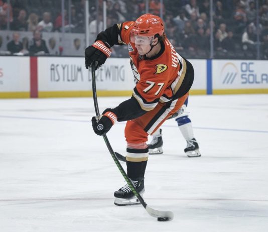 Anaheim Ducks right wing Frank Vatrano (77) shoots the puck during the first period of an NHL hockey game against the Tampa Bay Lightning, Sunday, Jan. 5, 2025, in Anaheim, Calif. (AP Photo/William Liang)