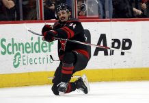 Carolina Hurricanes' Seth Jarvis (24) celebrates his game winning goal against the Boston Bruins during the third period of an NHL hockey game in Raleigh, N.C., Thursday, March 6, 2025. (AP Photo/Karl DeBlaker)