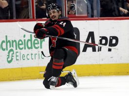 Carolina Hurricanes' Seth Jarvis (24) celebrates his game winning goal against the Boston Bruins during the third period of an NHL hockey game in Raleigh, N.C., Thursday, March 6, 2025. (AP Photo/Karl DeBlaker)