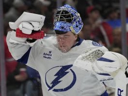 Tampa Bay Lightning goaltender Andrei Vasilevskiy spray water on on his face during the second period of an NHL hockey game against the Florida Panthers Monday, March 3, 2025, in Sunrise, Fla. (AP Photo/Lynne Sladky)