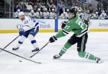 Dallas Stars left wing Mason Marchment (27) shoots during an NHL hockey game against the Tampa Bay Lightning in Dallas, Thursday, March 20, 2025. (AP Photo/Gareth Patterson)