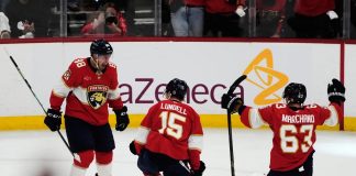 Florida Panthers center Anton Lundell (15) celebrates after his goal during the second period in Game 4 of an NHL hockey Stanley Cup first-round playoff series against the Tampa Bay Lightning, Monday, April 28, 2025, in Sunrise, Fla. (AP Photo/Marta Lavandier)