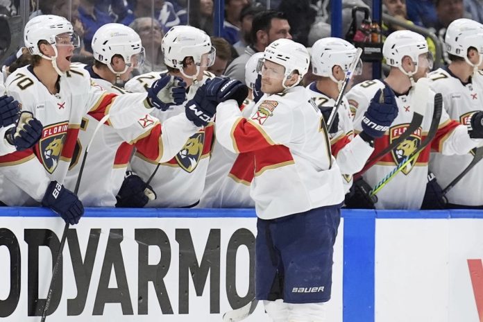 Panthers Defeat Lightning 6-2 Florida Panthers left wing Matthew Tkachuk (19) celebrates with the bench after scoring against the Tampa Bay Lightning during the second period in Game 1 of an NHL hockey Stanley Cup first-round playoff series, Tuesday, April 22, 2025, in Tampa, Fla. (AP Photo/Chris O'Meara)
