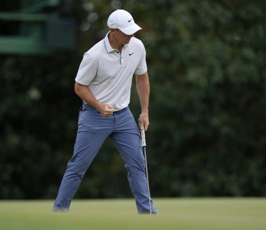 Rory McIlroy, of Northern Ireland, celebrates after making a putt on the fifth hole during the third round at the Masters golf tournament, Saturday, April 12, 2025, in Augusta, Ga. (AP Photo/Julia Demaree Nikhinson)