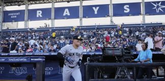 New York Yankees' Aaron Judge runs onto the field before a baseball game against the Tampa Bay Rays at George M. Steinbrenner Field Thursday, April 17, 2025, in Tampa, Fla. (AP Photo/Chris O'Meara)