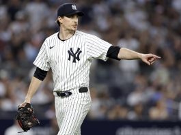 New York Yankees pitcher Max Fried reacts after the last out of the third inning of a baseball game against the Tampa Bay Rays, Friday, May 2, 2025, in New York. (AP Photo/Adam Hunger