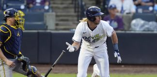 Tampa Bay Rays' Travis Jankowski, right, watches his RBI single off Milwaukee Brewers pitcher Trevor Megill during the ninth inning of a baseball game Saturday, May 10, 2025, in Tampa, Fla. (AP Photo/Chris O'Meara)