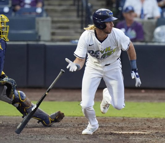 Tampa Bay Rays' Travis Jankowski, right, watches his RBI single off Milwaukee Brewers pitcher Trevor Megill during the ninth inning of a baseball game Saturday, May 10, 2025, in Tampa, Fla. (AP Photo/Chris O'Meara)