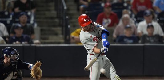Philadelphia Phillies' Trea Turner connects for an RBI single off Tampa Bay Rays pitcher Manuel Rodríguez during the 10th inning of a baseball game Thursday, May 8, 2025, in Tampa, Fla. (AP Photo/Chris O'Meara)