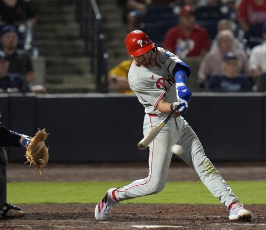 Philadelphia Phillies' Trea Turner connects for an RBI single off Tampa Bay Rays pitcher Manuel Rodríguez during the 10th inning of a baseball game Thursday, May 8, 2025, in Tampa, Fla. (AP Photo/Chris O'Meara)