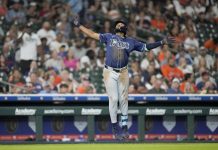 Tampa Bay Rays' Junior Caminero (13) celebrates his three-run home run against Houston Astros relief pitcher Bryan King during the seventh inning of a baseball game, Thursday, May 29, 2025, in Houston. (AP Photo/Karen Warren)