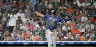 Tampa Bay Rays' Junior Caminero (13) celebrates his three-run home run against Houston Astros relief pitcher Bryan King during the seventh inning of a baseball game, Thursday, May 29, 2025, in Houston. (AP Photo/Karen Warren)