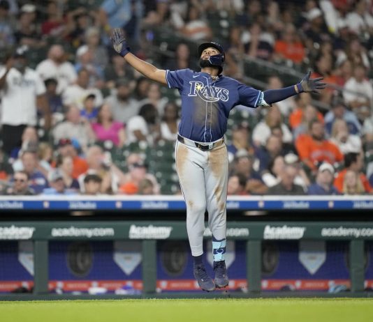 Tampa Bay Rays' Junior Caminero (13) celebrates his three-run home run against Houston Astros relief pitcher Bryan King during the seventh inning of a baseball game, Thursday, May 29, 2025, in Houston. (AP Photo/Karen Warren)