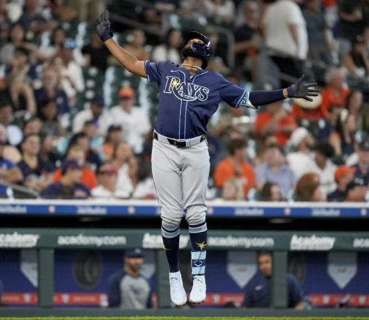 Tampa Bay Rays' Junior Caminero celebrates his solo home run against the Houston Astros during the fourth inning of a baseball game, Saturday, May 31, 2025, in Houston. (AP Photo/Eric Christian Smith)