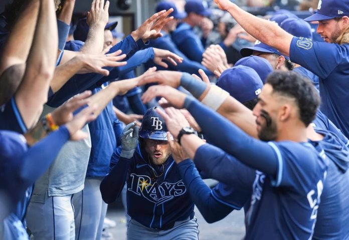 Rays Defeat Blue Jays 8-3 Tampa Bay Rays' Brandon Lowe, center, is greeted in the dugout after hitting a two-run home run in the ninth inning of a baseball game against the Toronto Blue Jays in Toronto, Thursday, May 15, 2025. (Nathan Denette/The Canadian Press via AP)