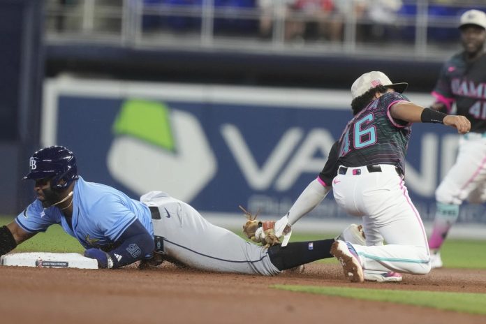 Rays Defeat Marlins 4-0 Tampa Bay Rays' Yandy Díaz (2) as Miami Marlins short stop Javier Sanoja (46) is late with the tags during the first inning of a baseball game, Saturday, May 17, 2025, in Miami. (AP Photo/Marta Lavandier)