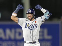 Tampa Bay Rays' José Caballero celebrates his two-run double off Minnesota Twins pitcher Kody Funderburk during the eighth inning of a baseball game Monday, May 26, 2025, in Tampa, Fla. (AP Photo/Chris O'Meara)