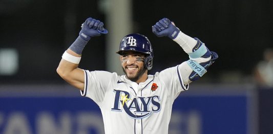 Tampa Bay Rays' José Caballero celebrates his two-run double off Minnesota Twins pitcher Kody Funderburk during the eighth inning of a baseball game Monday, May 26, 2025, in Tampa, Fla. (AP Photo/Chris O'Meara)