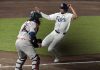 Tampa Bay Rays' Christopher Morel scores the game-winning run in front of Houston Astros catcher Victor Caratini on a sacrifice fly by Taylor Walls during the ninth inning of a baseball game Tuesday, May 20, 2025, in Tampa, Fla. (AP Photo/Chris O'Meara)
