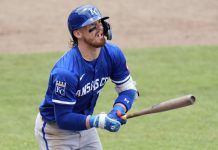 Kansas City Royals' Bobby Witt Jr. watches his two-run home run off Tampa Bay Rays pitcher Shane Baz during the fifth inning of a baseball game Thursday, May 1, 2025, in Tampa, Fla. (AP Photo/Chris O'Meara)