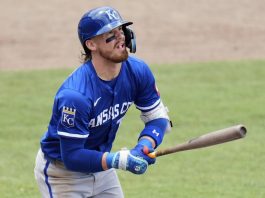 Kansas City Royals' Bobby Witt Jr. watches his two-run home run off Tampa Bay Rays pitcher Shane Baz during the fifth inning of a baseball game Thursday, May 1, 2025, in Tampa, Fla. (AP Photo/Chris O'Meara)