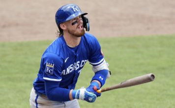 Kansas City Royals' Bobby Witt Jr. watches his two-run home run off Tampa Bay Rays pitcher Shane Baz during the fifth inning of a baseball game Thursday, May 1, 2025, in Tampa, Fla. (AP Photo/Chris O'Meara)