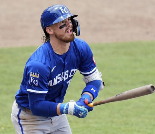 Kansas City Royals' Bobby Witt Jr. watches his two-run home run off Tampa Bay Rays pitcher Shane Baz during the fifth inning of a baseball game Thursday, May 1, 2025, in Tampa, Fla. (AP Photo/Chris O'Meara)