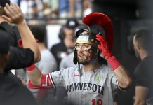 Minnesota Twins Kody Clemens (18) celebrates his home run during the second inning of a baseball game against the Tampa Bay Rays Tuesday, May 27, 2025, in Tampa, Fla. (AP Photo/Jason Behnken)