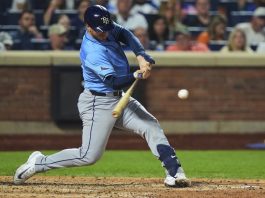 Tampa Bay Rays' Danny Jansen hits a two-run home run during the sixth inning of a baseball game against the New York Mets Friday, June 13, 2025, in New York. (AP Photo/Frank Franklin II)